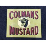 A hand painted "Colmans Mustard" advertisement on board