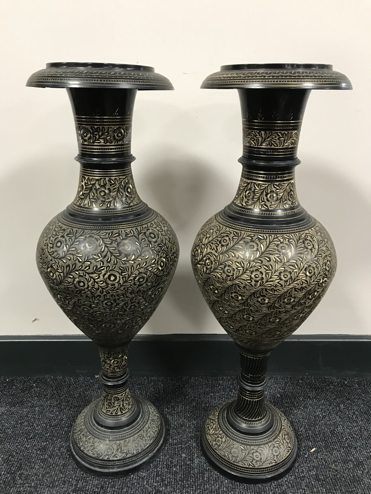 A pair of Indian brass vases