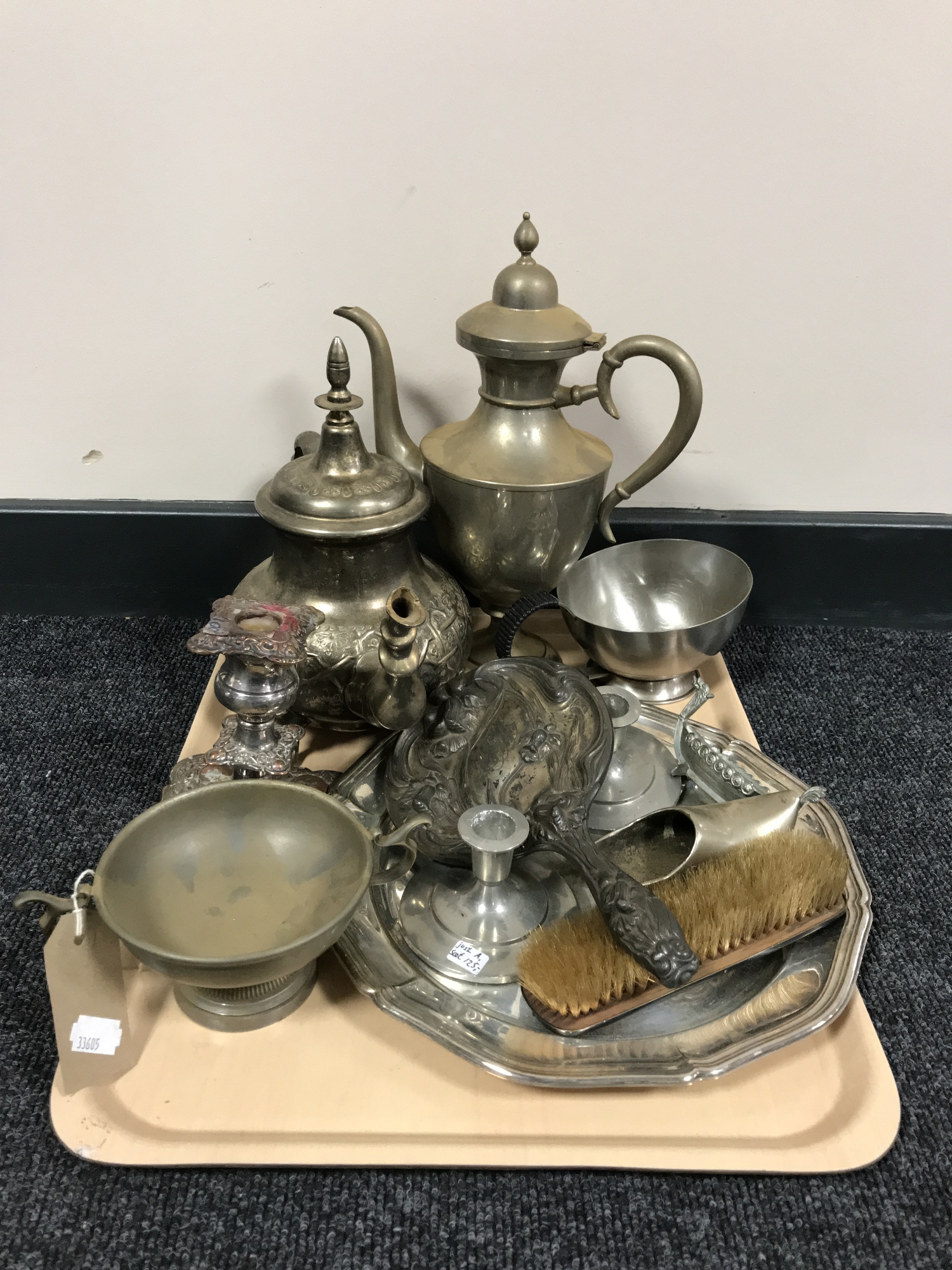 A tray of twentieth century plated ware including teapots, candlesticks,
