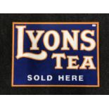A hand painted "Lions Tea" advertisement on board