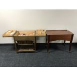 Two mid 20th century sewing trolleys and accessories