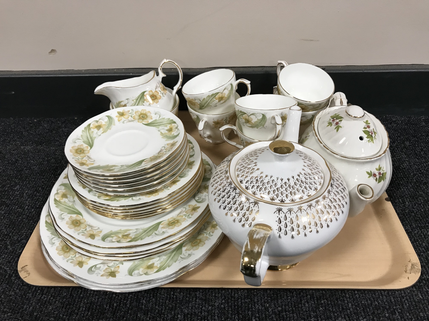 A tray of part Duchess Greensleaves tea service,