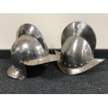 Two period style military helmets