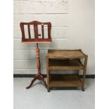 An oak three tier trolley together with a contemporary music stand