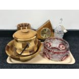 A tray of walnut Quartz mantel clock, treen fruit bowl and lidded barrel,