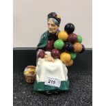 A Royal Doulton china figure : The Old Balloon Seller, HN 1315, height 20 cm.