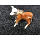 A Beswick figure of a calf