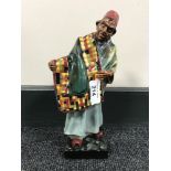 A Royal Doulton china figure : Carpet Seller, HN 1464, height 23 cm.