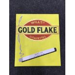 A hand painted "Wills Golden Flakes Cigarette" advertisement on board