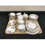 A tray of thirty six pieces of Colclough pink rose tea china and a pair of Adderley plates