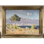 An Artagraph reproduction : Coastal landscape with mountains beyond, framed.