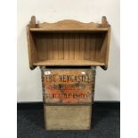 A vintage Newcastle Breweries wooden beer crate together with a small pine box and a pine wall