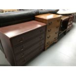 A mahogany effect bedside chest, five drawer chest,