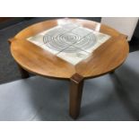 A late 20th century Danish teak tiled topped coffee table
