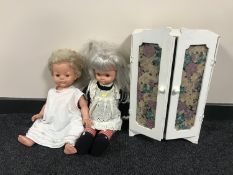 A box of two mid 20th century dolls and a painted doll's wardrobe