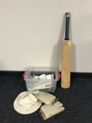 A box of cricket memorabilia to include a pair of batsman's gloves (by repute used by New Zealand