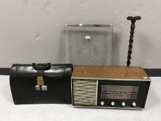 A mid 20th century Pye radio, leather doctors bag,