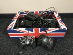 A box of Xbox console with leads and controllers, house phones,