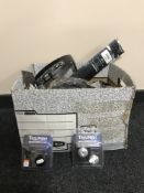 A box of Triumph motor bike accessories