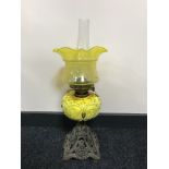 An early 20th century Duplex oil lamp with a yellow glass shade CONDITION REPORT: