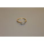 An 18ct gold diamond cluster ring CONDITION REPORT: The ring is in good condition.