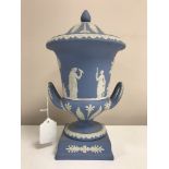 A Wedgwood Jasper Ware twin handled urn with cover, height 31 cm.