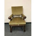 A continental oak armchair