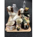 A tray of two Doulton toby jugs, crystal basket and decanter, pair of dog figures,