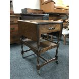 An oak drop leaf trolley