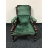 A Victorian mahogany armchair in green fabric CONDITION REPORT: Frame with typical