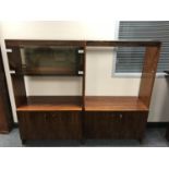 A mid 20th century teak and rosewood veneered two part modular room divider, height 152 cm,