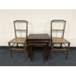 A pair of mahogany bedroom chairs and a nest of Parker Knoll tables