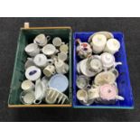 Two boxes of assorted tea china, Sylvac caddies, teapots,