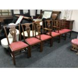 A set of six Edwardian mahogany dining chairs