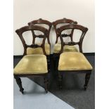 Four antique mahogany dining chairs