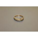 An 18ct gold 10 stone diamond ring,