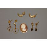A 14ct gold cameo brooch, together with a pair of garnet earrings,