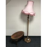 A mahogany coffee table and an oak standard lamp and shade