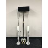 A contemporary chrome standard lamp,