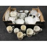 A box of assorted dinner ware, mugs,