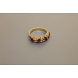 An 18ct gold ruby and diamond ring