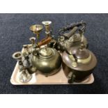 A tray of vintage brass and copper kettles, brass candle holders,