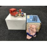 A boxed Coalport Characters Postman Pat - early in the morning figure and a boxed Wade money box