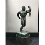 A bronze figure - Body Builder, on marble socle, height 54 cm.