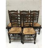 A set of five ladder backed country kitchen chairs