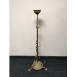 A brass telescopic Art Nouveau lamp stand