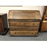 A 19th century oak bureau,