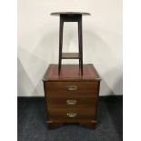 A mahogany leather topped ship's style chest and an occasional table