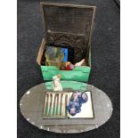 A box of china book ends, plated cutlery, glass jug, framed map,