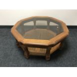 An octagonal two tier coffee table